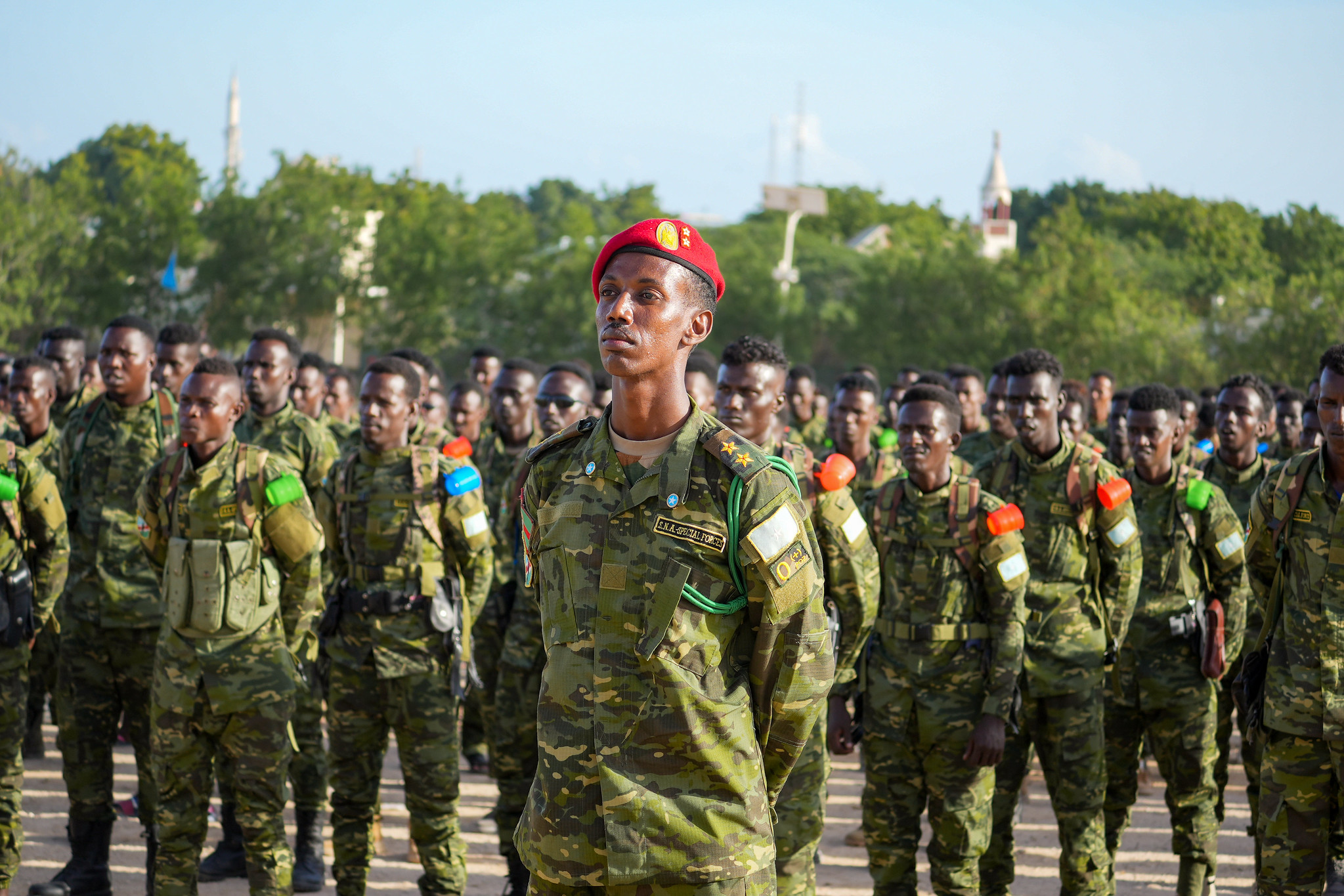 Somali soldiers in ceremonial uniform stand in formation during the 26 June Independence Day celebration in Mogadishu, Somalia, symbolizing national pride and unity.