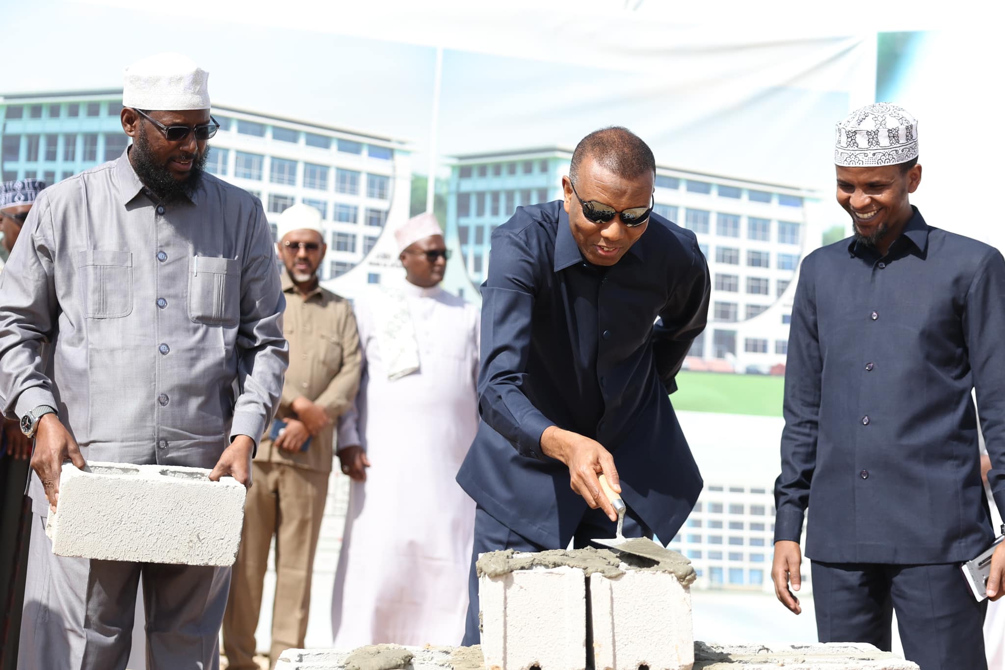 Prime Minister Hamza Abdi Barre, Minister of Endowments and Religious Affairs Mukhtar Robow, and the Director General of the Ministry of Endowments and Religious Affairs laying the foundation stone for Somalia's Daarul Iftaa in Mogadishu.