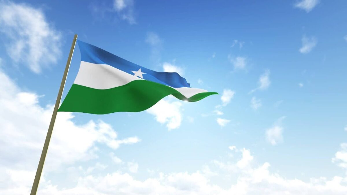 The flag of Puntland waving the sky.