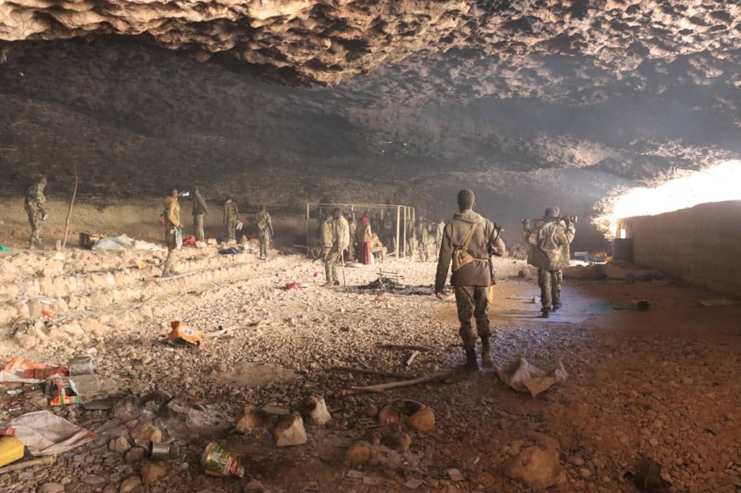 Puntland security forces inside a cave believed to have been a major base for ISIS militants in the Buqa Caleed mountains.