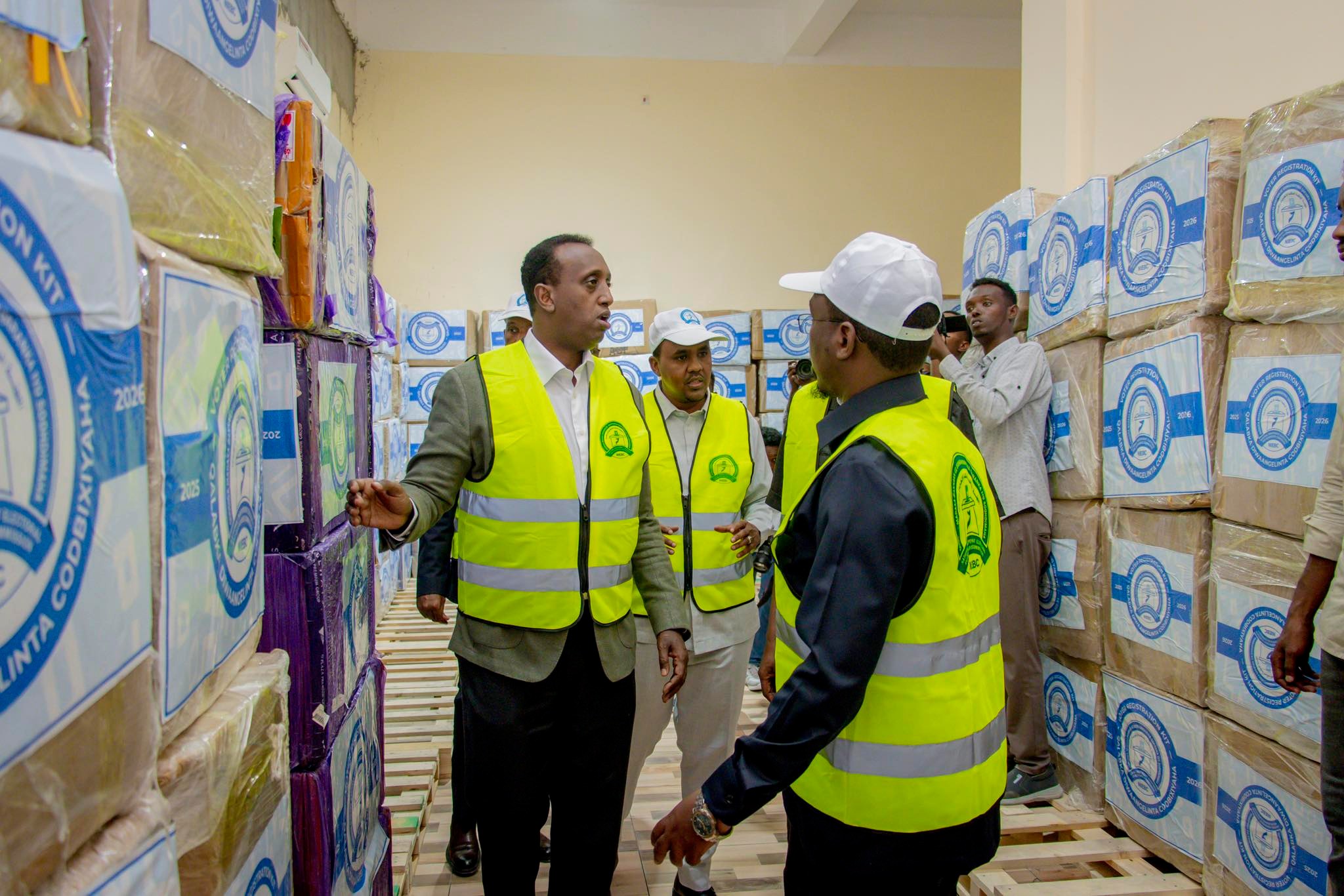 Chairman of the National Independent Electoral Commission (NIEC), Abdikarim Ahmed Hassan, inspecting voting equipment for the local elections.