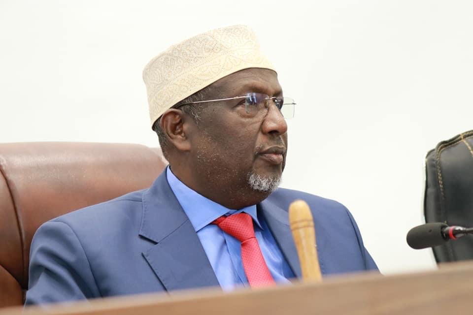 Somali Parliament Speaker Mohamed Mursal Sheikh Abdirahman sitting in a formal setting, as tensions rise over a motion to remove him from office.