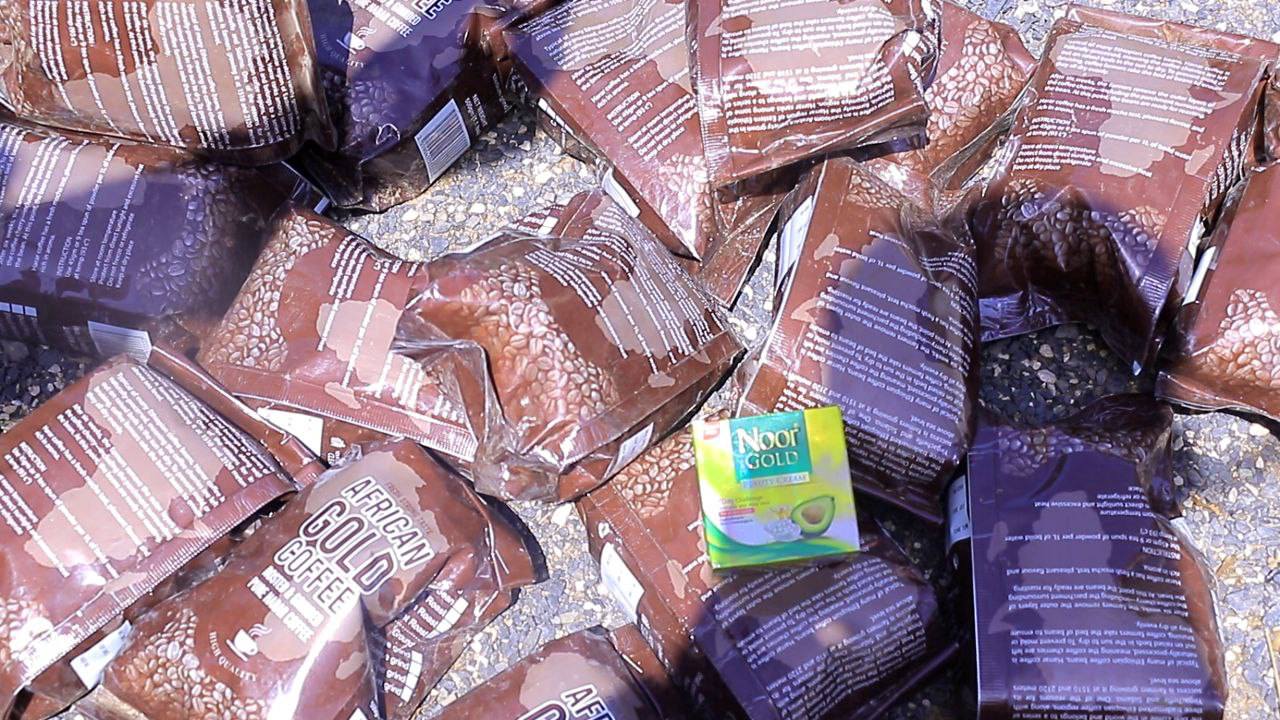 Agency staff inspecting and confiscating expired food and beverage products during a two-day operation in Jigjiga, Somali Regional State