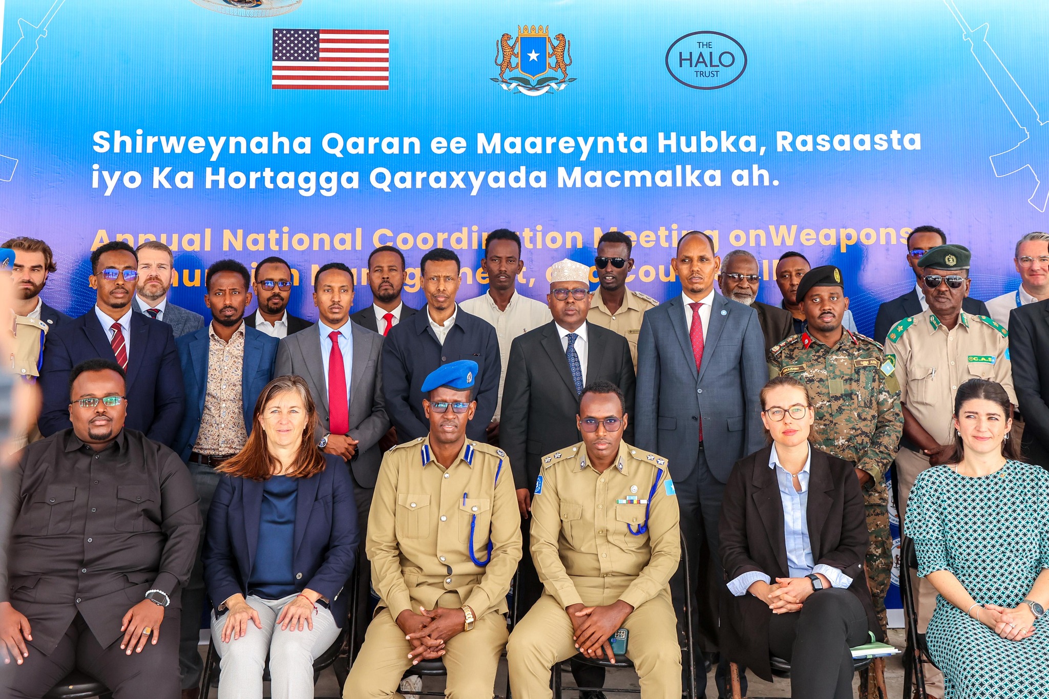 Image showing the National Conference on Arms Management and Prevention of Improvised Explosive Devices underway in Mogadishu, with the Minister of Defense and other officials attending.